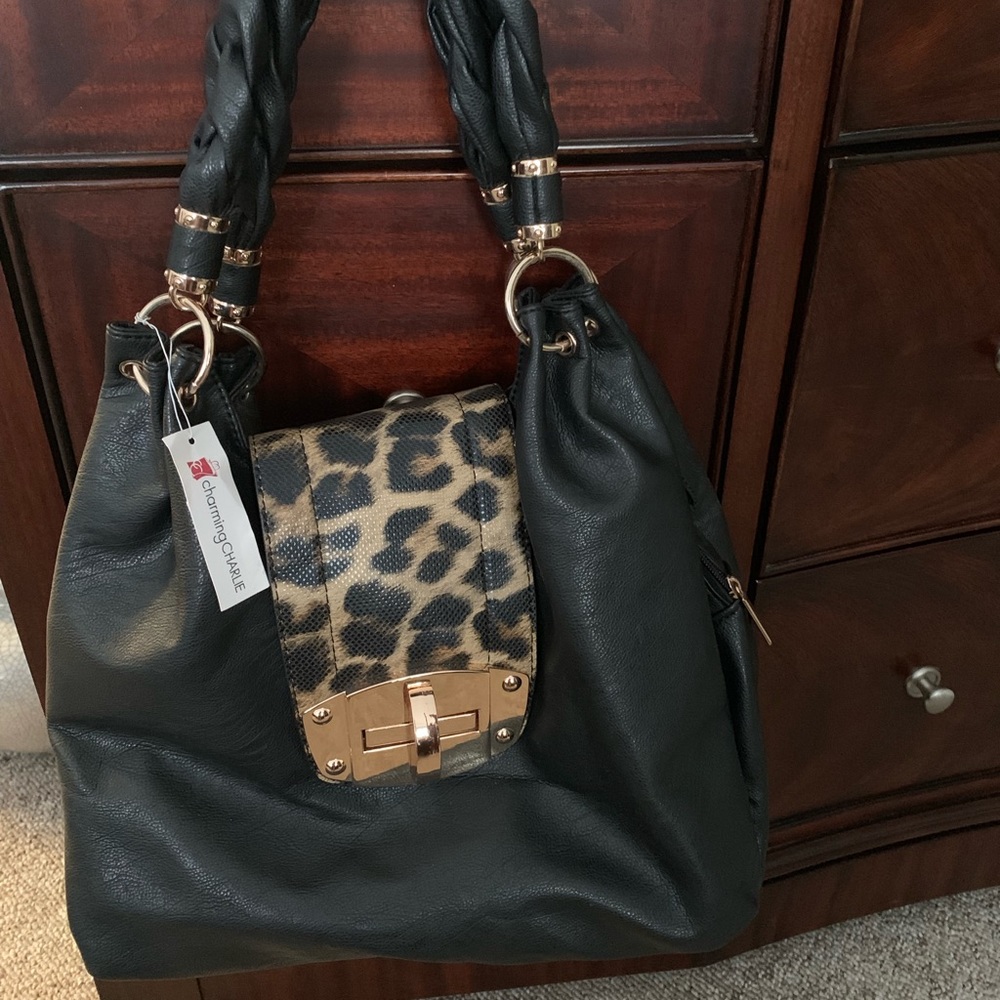 Charming Charlie black by with leopard accent flap